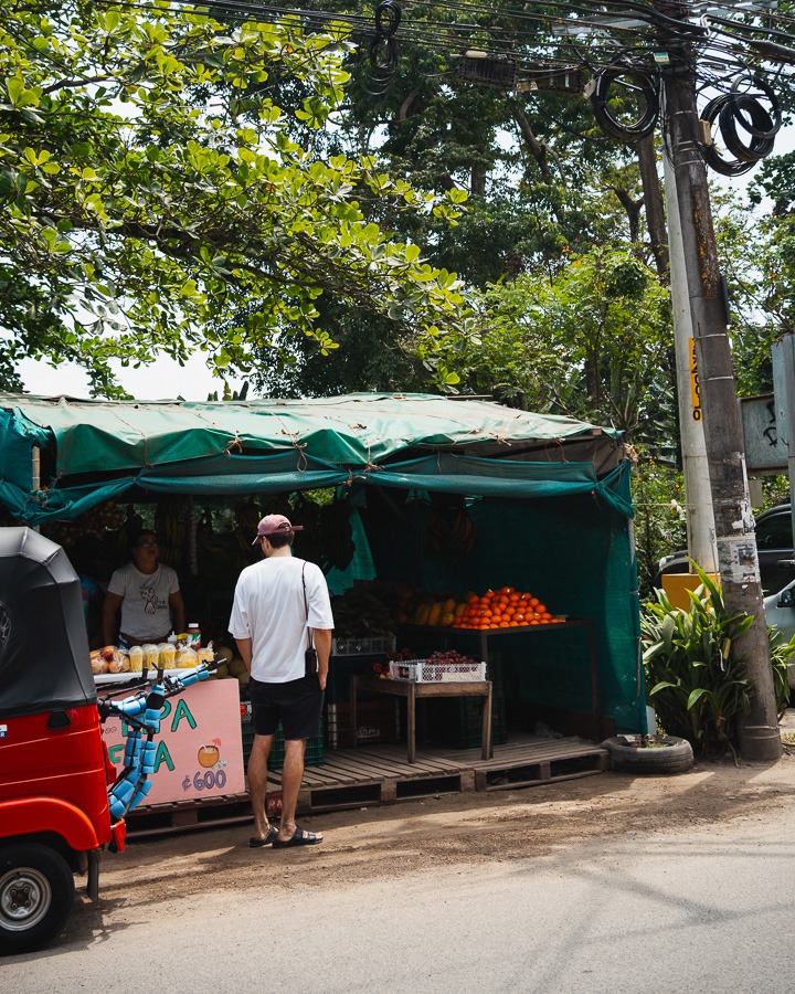 a man at a local market in Puerto Viejo