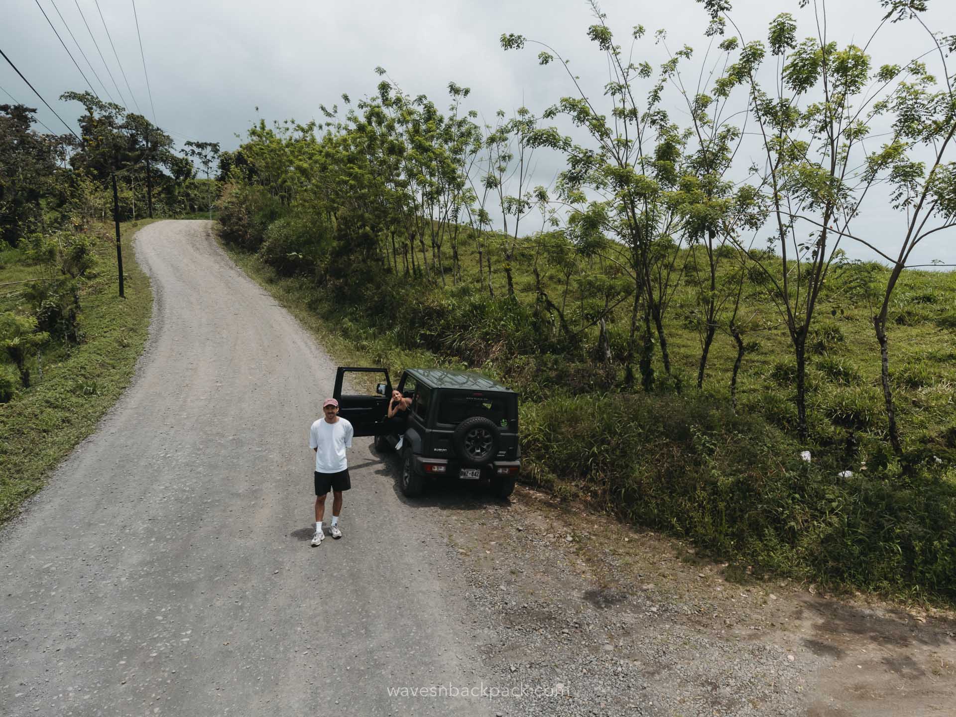 a young couple in a car in Costa Rica